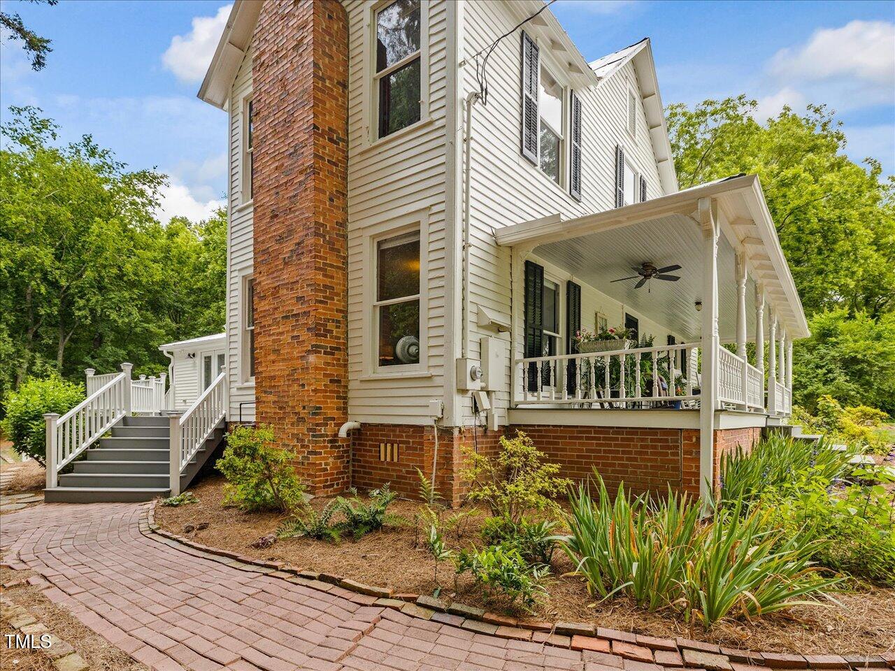 967 Bynum Road Pittsboro, NC 27312 - Photo 54 of 100 front view of a house with a small yard