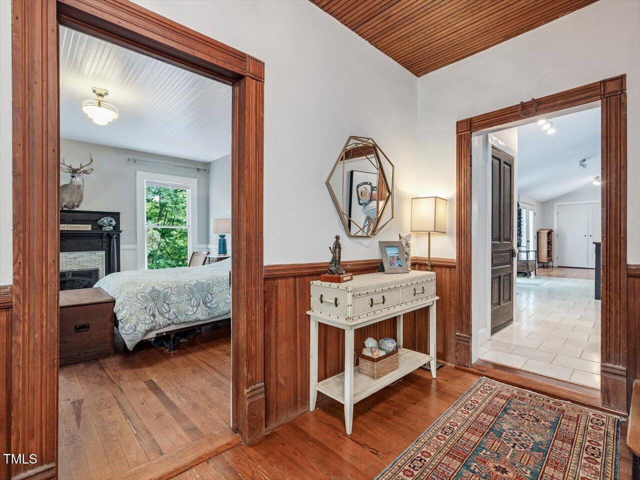 967 Bynum Road Pittsboro, NC 27312 - Photo 58 of 100 a living room with a table and a potted plant