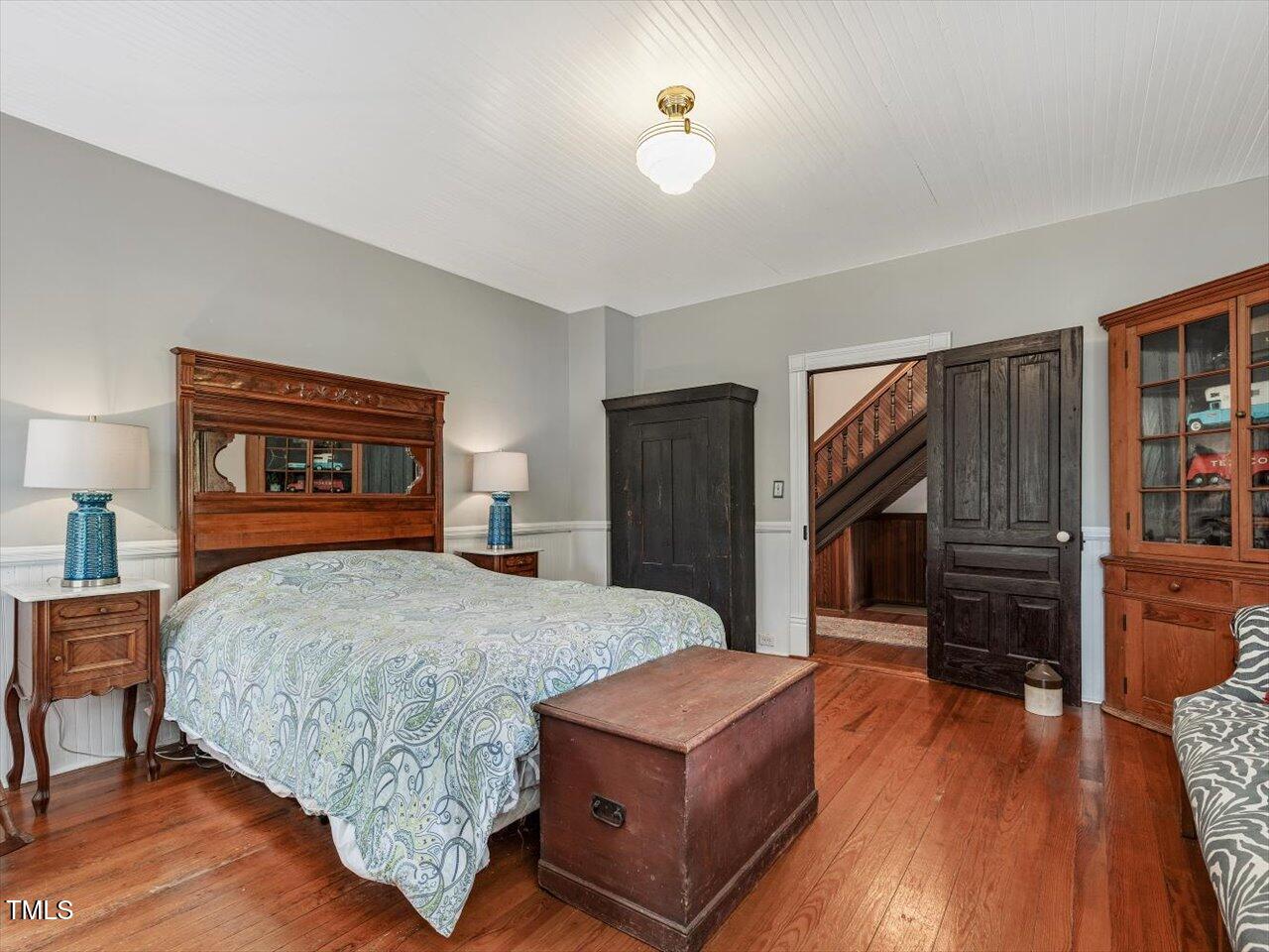 967 Bynum Road Pittsboro, NC 27312 - Photo 60 of 100 a bedroom with a bed and a dresser