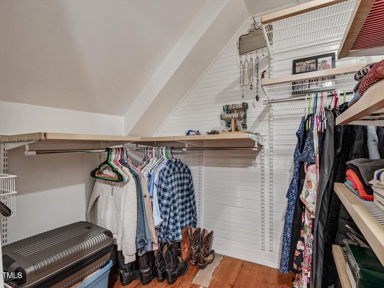 967 Bynum Road Pittsboro, NC 27312 - Photo 79 of 100 a view of walk in closet with clothes and shoes
