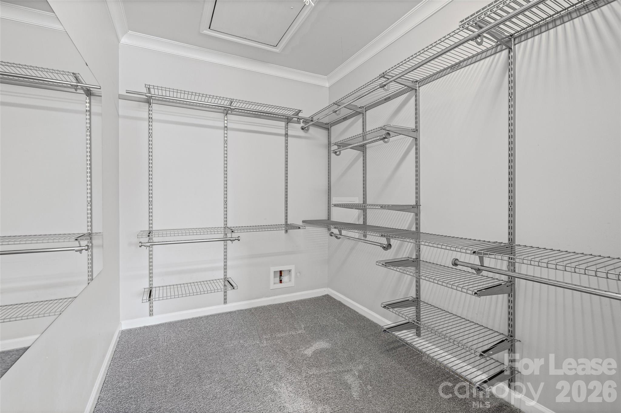 113 Stroupe Road, Unit E Gastonia, NC 28056 - Photo 20 of 33 a view of an empty walk in closet