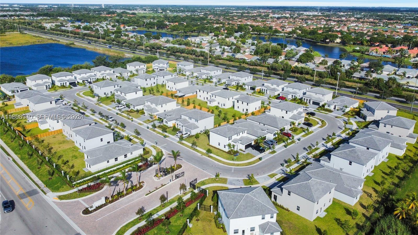 2647 Southeast 8th Street Homestead, FL 33030 - Photo 20 of 25 an aerial view of residential building and lake