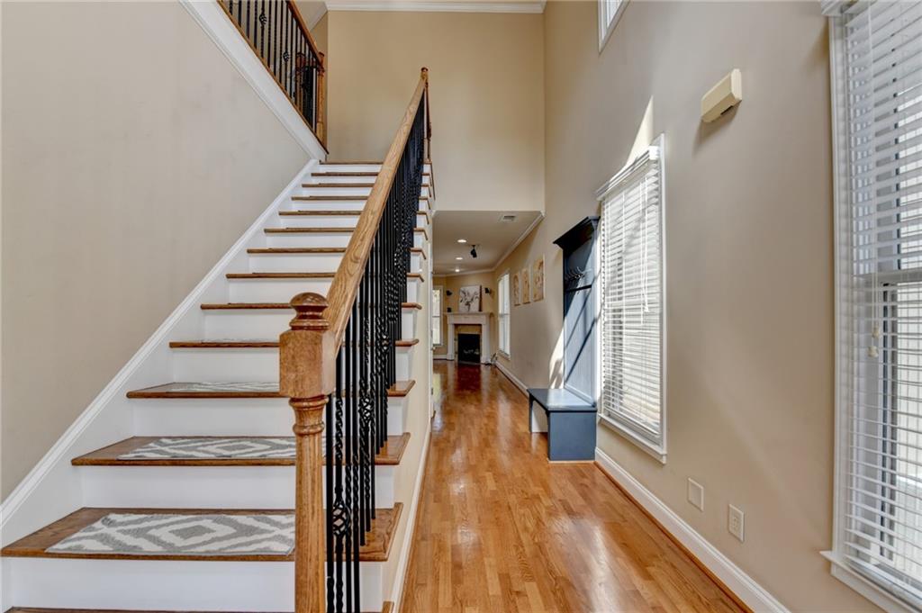 5063 Micaela Way Duluth, GA 30096 - Photo 7 of 61 a view of entryway and hall with wooden floor