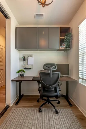 a bedroom with furniture and a window