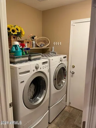 a utility room with dryer and washer
