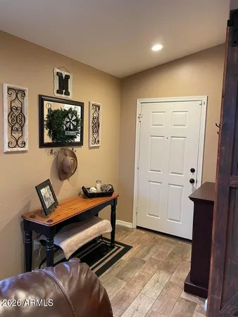a living room with furniture and a window