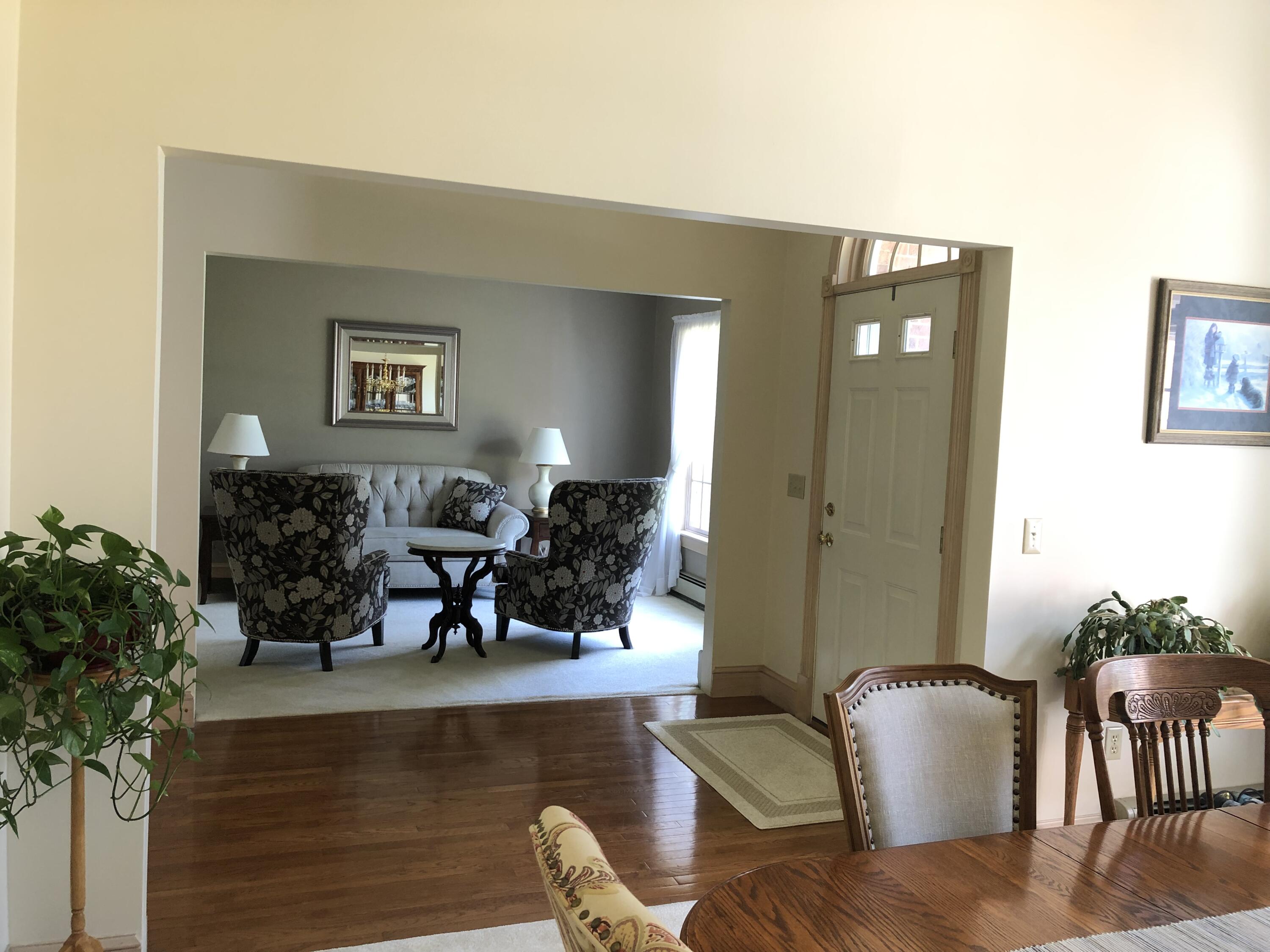 250 Bear Pond Road Turner, ME 04282 - Photo 25 of 75 Parlor on right, formal DR on left.