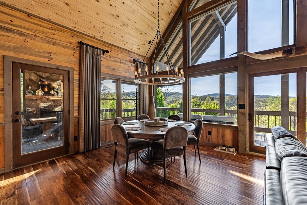 239 Covered Bridge Lane Cherry Log, GA 30522 - Photo 13 of 50 a view of a dining room with furniture window and outside view