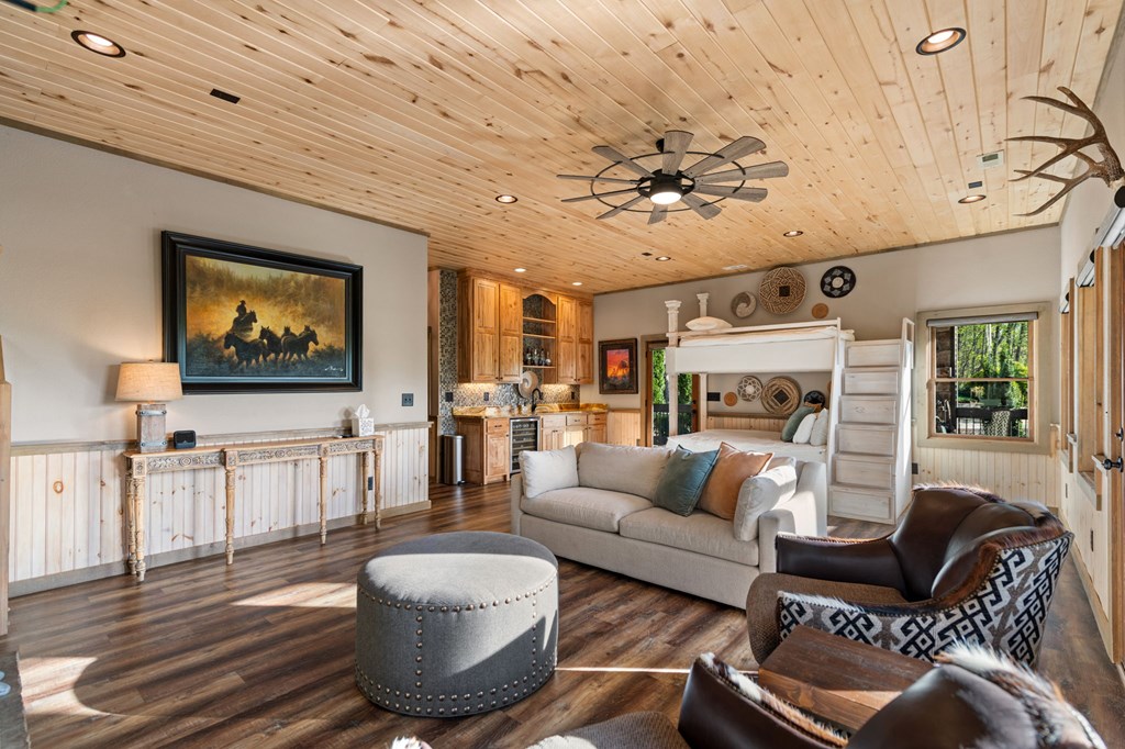 239 Covered Bridge Lane Cherry Log, GA 30522 - Photo 33 of 50 a living room with furniture and a flat screen tv