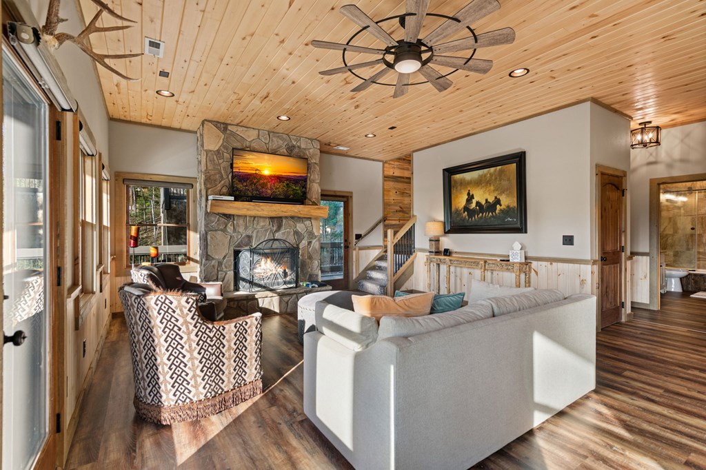 239 Covered Bridge Lane Cherry Log, GA 30522 - Photo 34 of 50 a living room with fireplace furniture and a flat screen tv