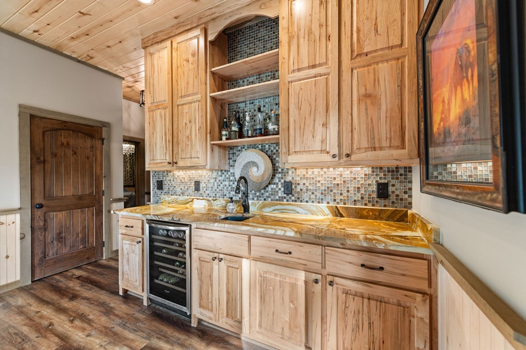 239 Covered Bridge Lane Cherry Log, GA 30522 - Photo 35 of 50 a kitchen with stainless steel appliances a sink and cabinets