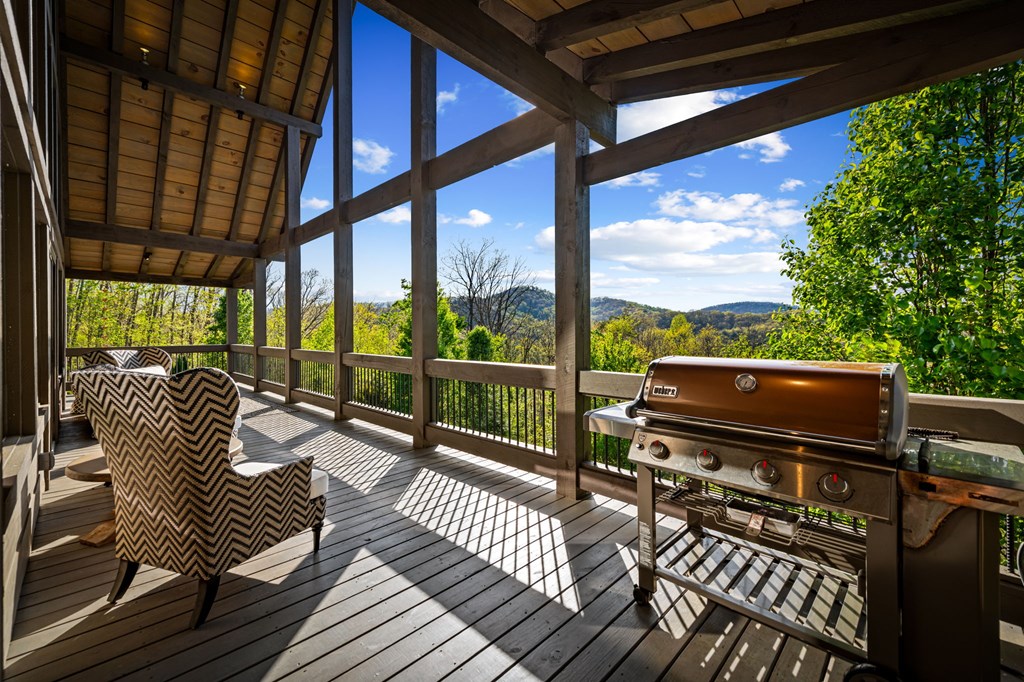 239 Covered Bridge Lane Cherry Log, GA 30522 - Photo 44 of 50 a view of a balcony with wooden floor next to a yard
