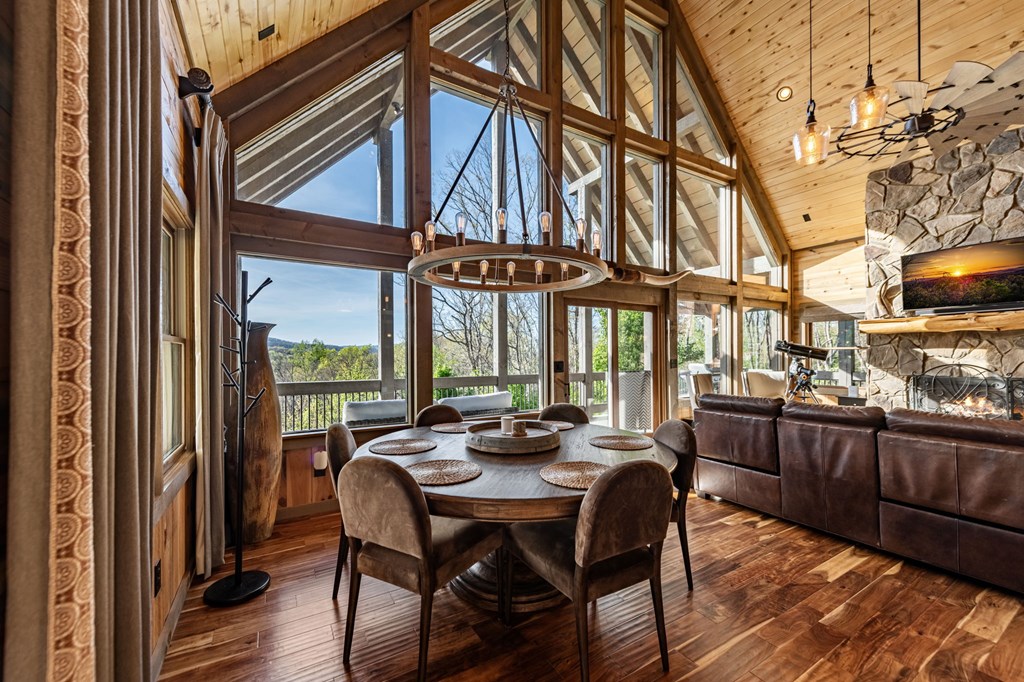 239 Covered Bridge Lane Cherry Log, GA 30522 - Photo 10 of 50 a view of a dining room with furniture window and wooden floor