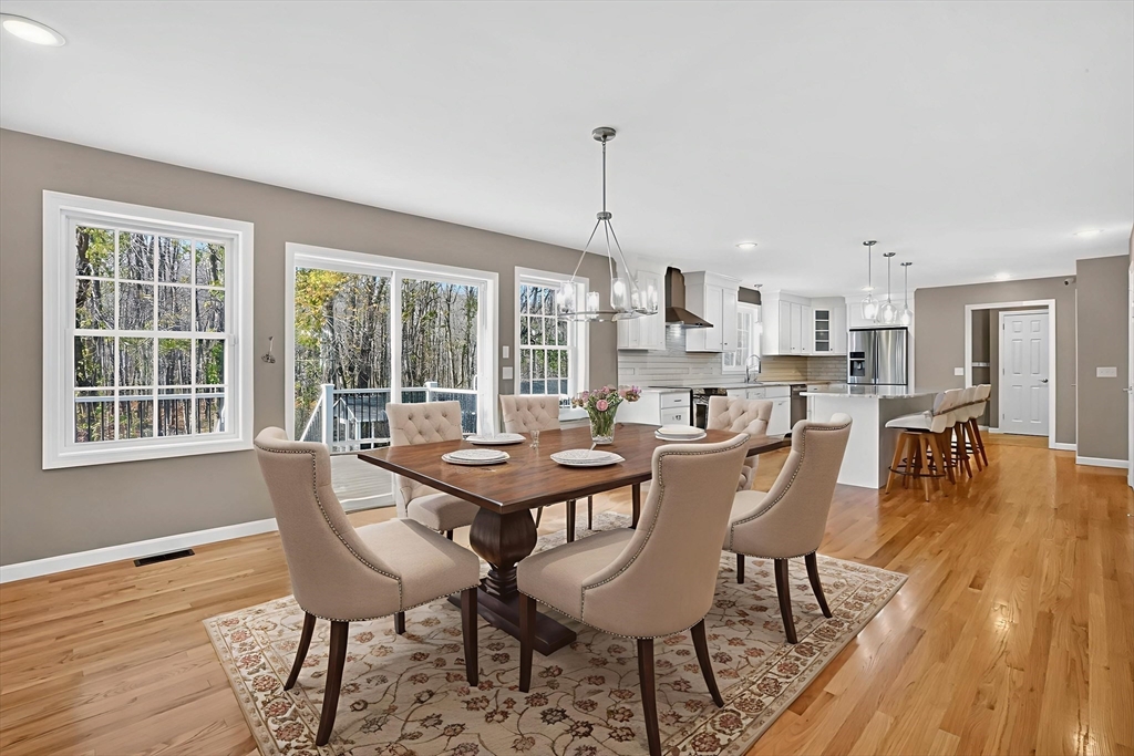 733 Monson Road Wilbraham, MA 01095 - Photo 11 of 40 a view of a dining room with furniture window and wooden floor