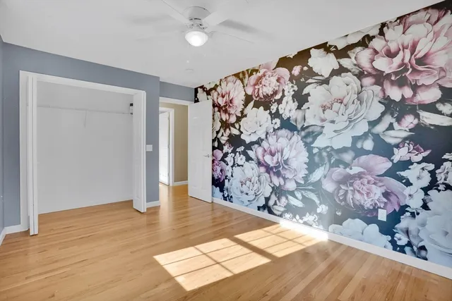 a view of entryway with wooden floor