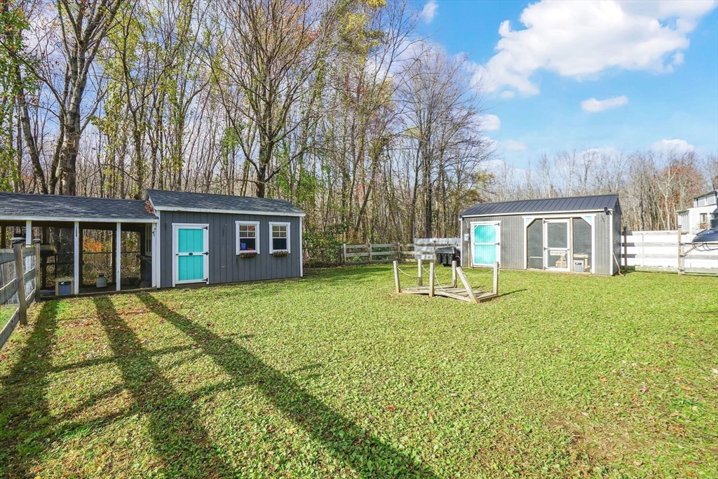 733 Monson Road Wilbraham, MA 01095 - Photo 39 of 40 a view of a house with a backyard