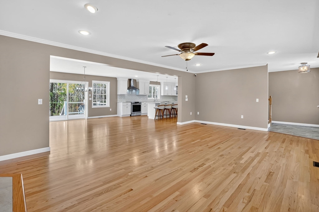 733 Monson Road Wilbraham, MA 01095 - Photo 8 of 40 a view of empty room with wooden floor and fan