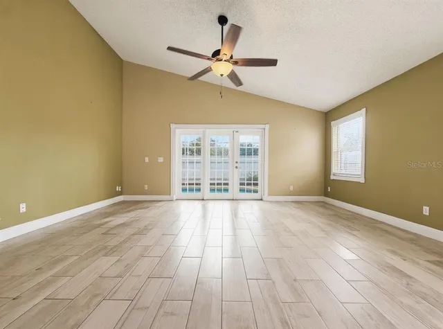a backyard of a house with lots of green space