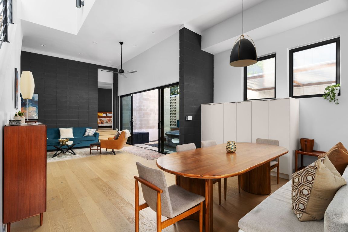 1206 Luna Street Austin, TX 78721 - Photo 13 of 27 a dining room with furniture and window