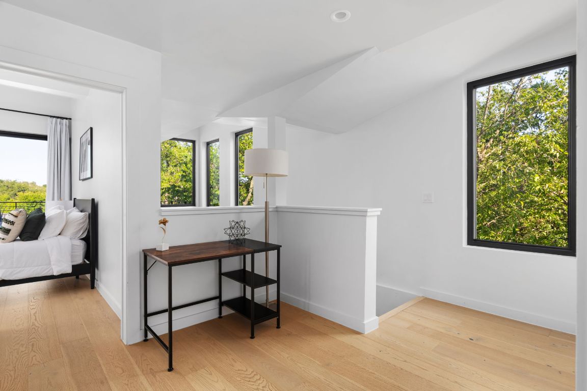 1206 Luna Street Austin, TX 78721 - Photo 22 of 27 a view of a livingroom with furniture and a window