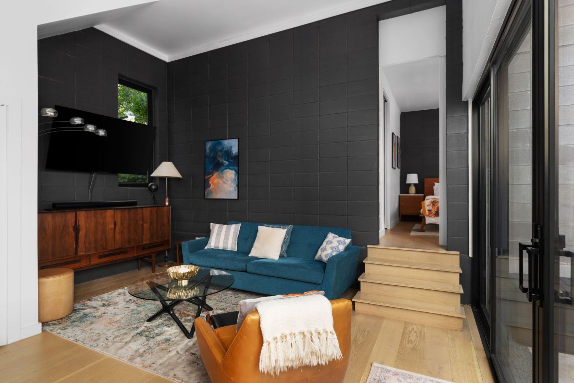 1206 Luna Street Austin, TX 78721 - Photo 10 of 27 a living room with furniture and a fireplace