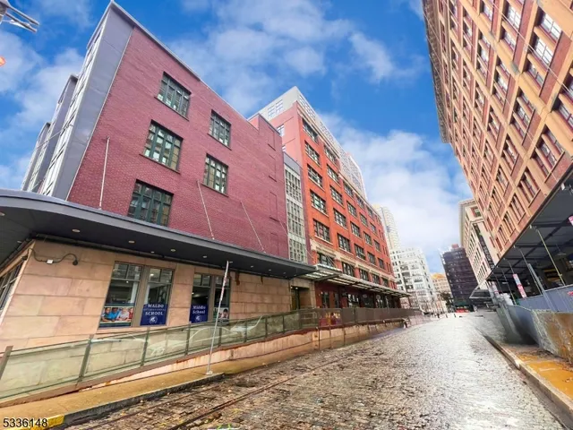 a view of a building with a street