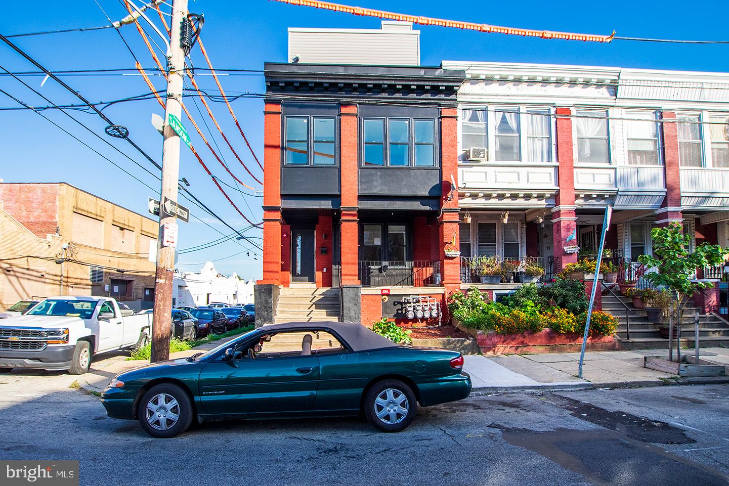 129 South 49th Street, Unit 1F Philadelphia, PA 19139 - Photo 17 of 18 a car parked in front of a building