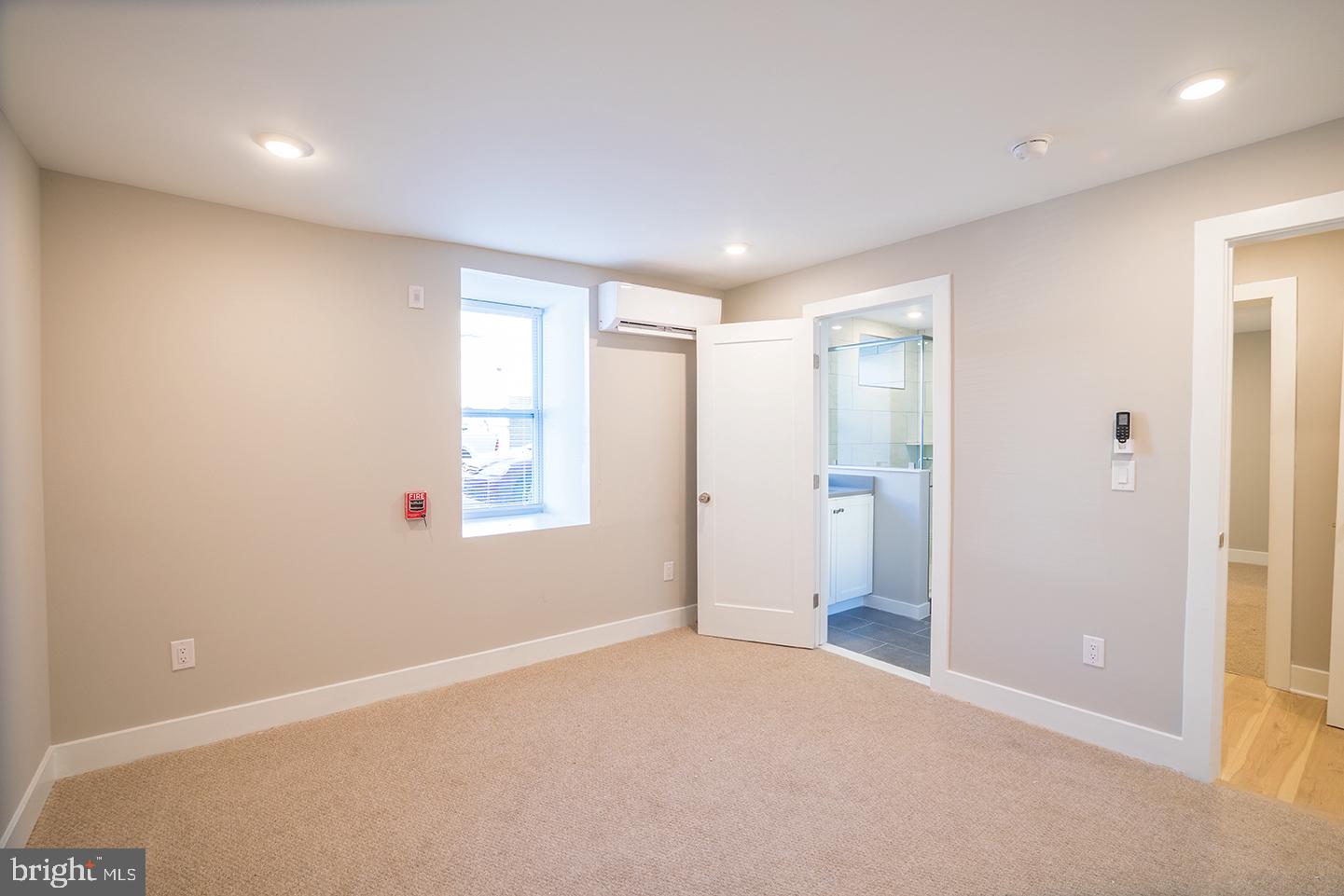129 South 49th Street, Unit 1F Philadelphia, PA 19139 - Photo 10 of 18 a view of an empty room with a window