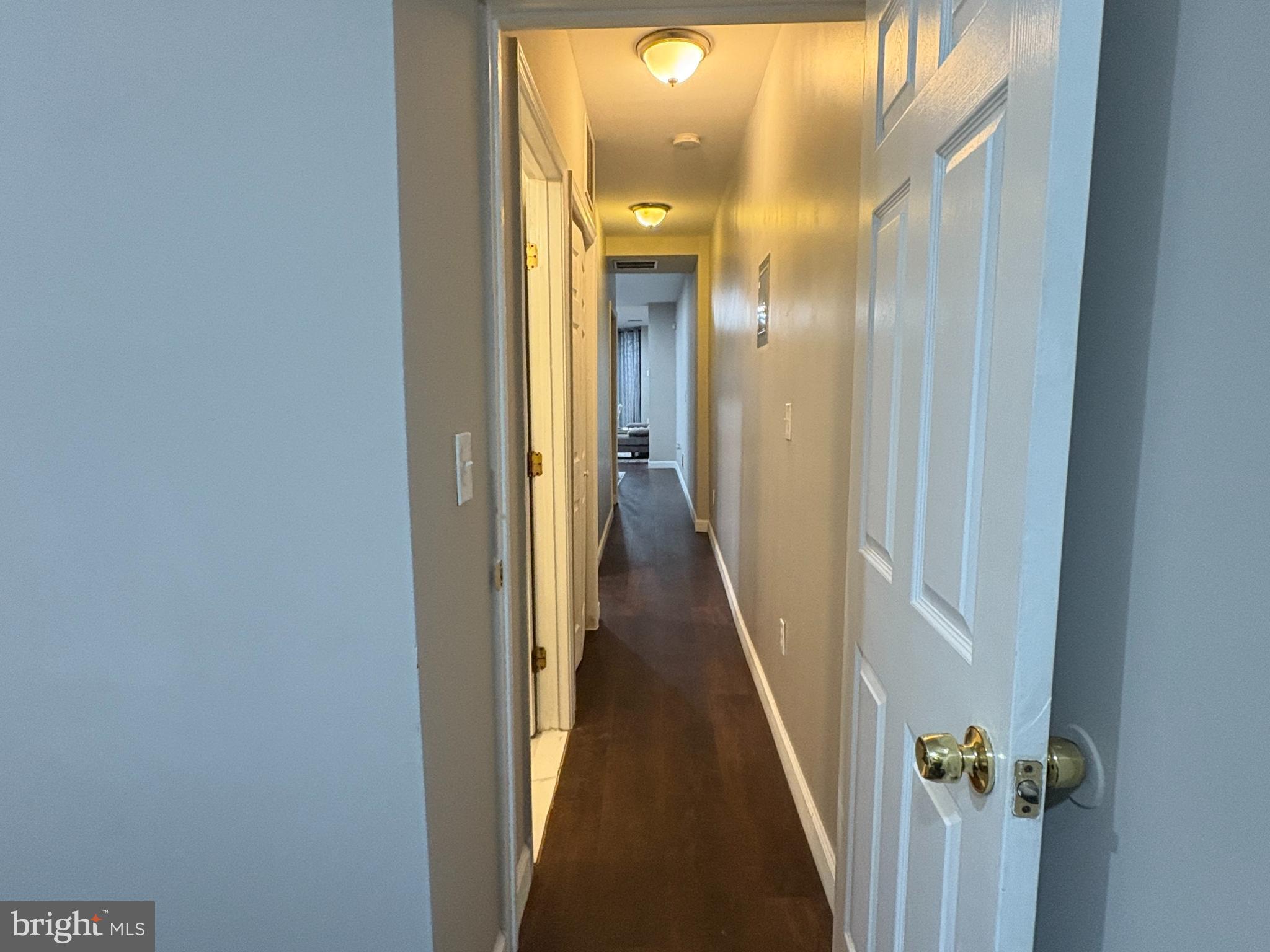 222 North Liberty Street, Unit 2 Baltimore, MD 21201 - Photo 12 of 15 a view of a hallway with a glass door