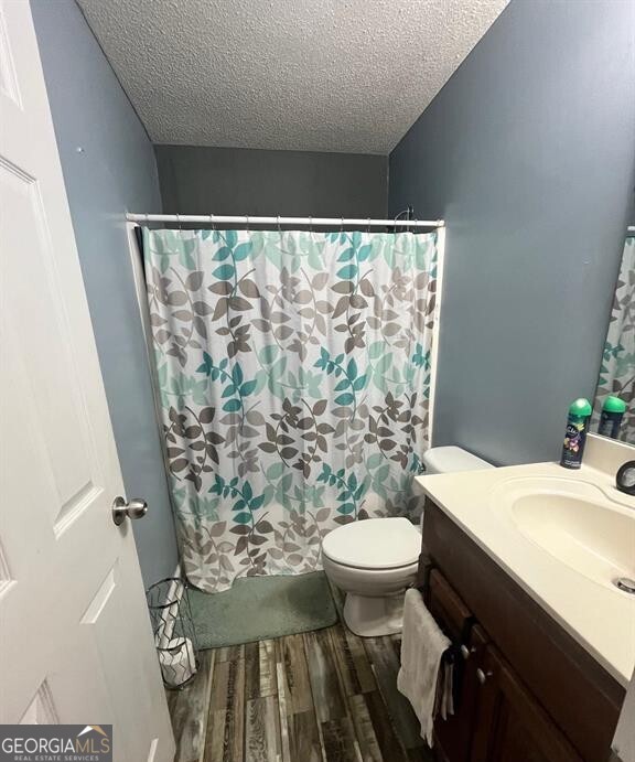 208 Sugarloaf Parkway Perry, GA 31069 - Photo 10 of 11 a bathroom with a sink toilet and shower