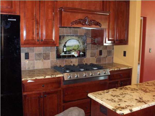 196 West Burnis Road Crestview, FL 32539 - Photo 12 of 13 a kitchen with a stove and a refrigerator