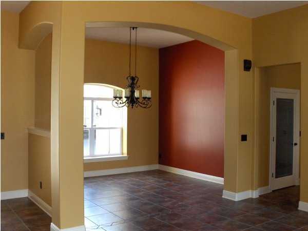 196 West Burnis Road Crestview, FL 32539 - Photo 8 of 13 a view of empty room with wooden floor