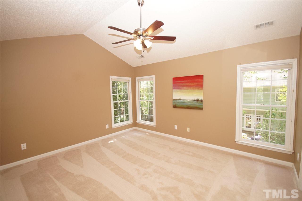 5208 Blakeley Lane Raleigh, NC 27613 - Photo 14 of 25 a view of a livingroom with a ceiling fan and window
