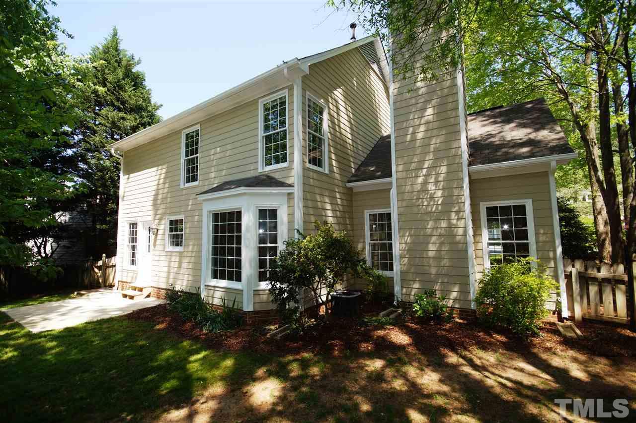 5208 Blakeley Lane Raleigh, NC 27613 - Photo 22 of 25 a view of a house with a yard