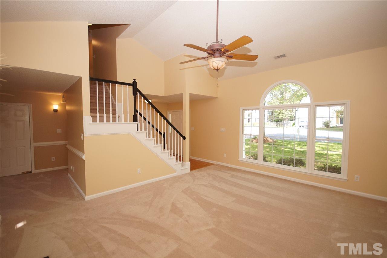 5208 Blakeley Lane Raleigh, NC 27613 - Photo 7 of 25 a view of an empty room with a window