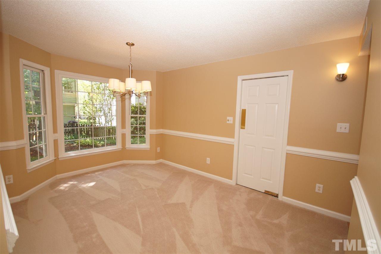 5208 Blakeley Lane Raleigh, NC 27613 - Photo 9 of 25 a view of an empty room with a window