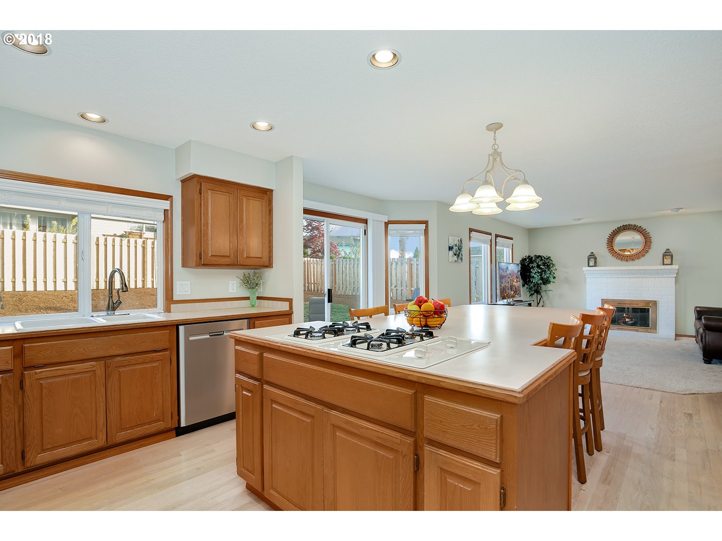 10470 Southwest 135th Avenue Beaverton, OR 97008 - Photo 14 of 32 a kitchen with a sink appliances and a counter top space