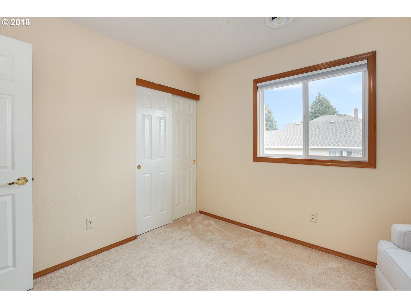 10470 Southwest 135th Avenue Beaverton, OR 97008 - Photo 19 of 32 a view of an empty room with a window