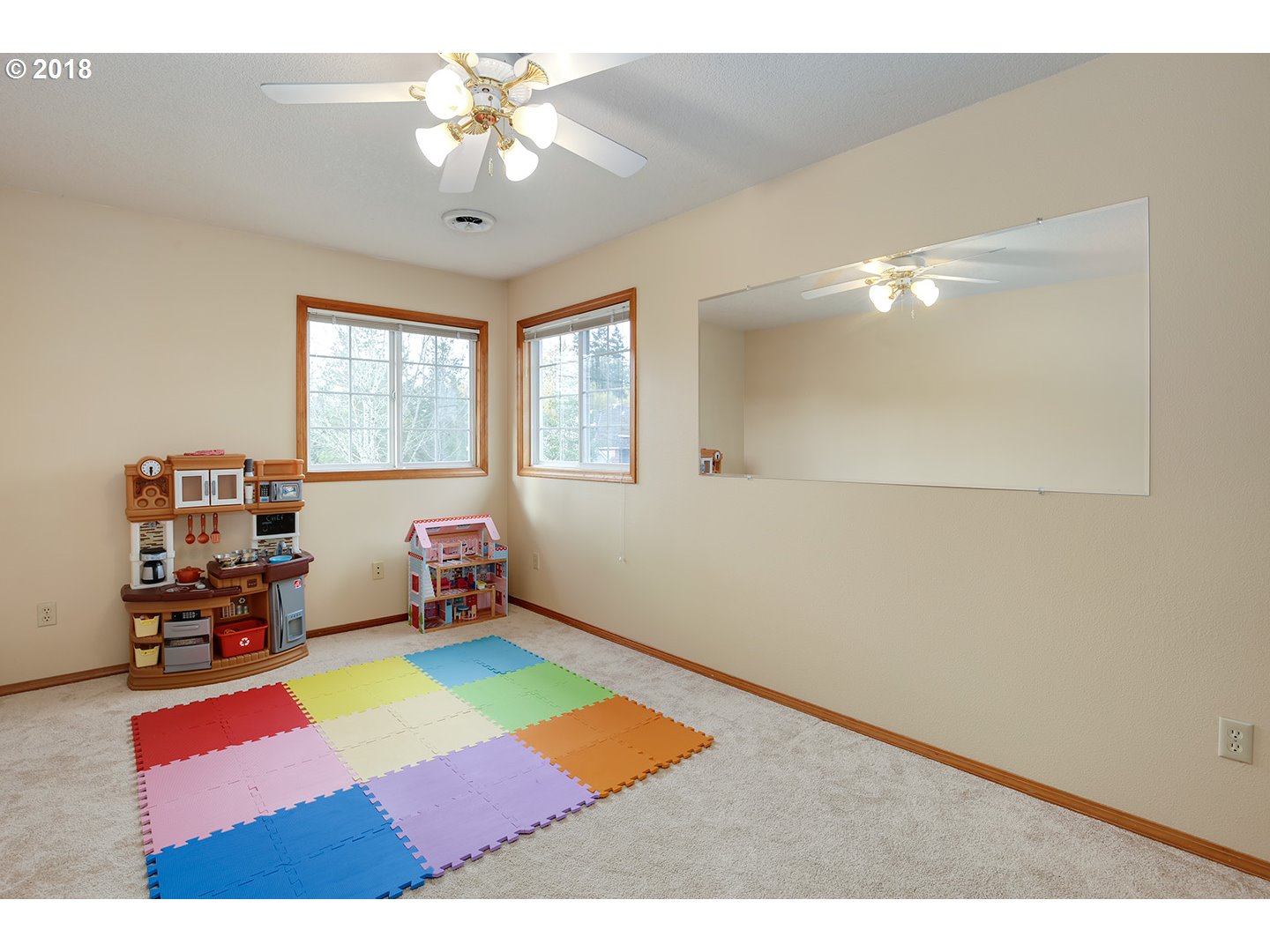 10470 Southwest 135th Avenue Beaverton, OR 97008 - Photo 21 of 32 a bedroom with furniture and window