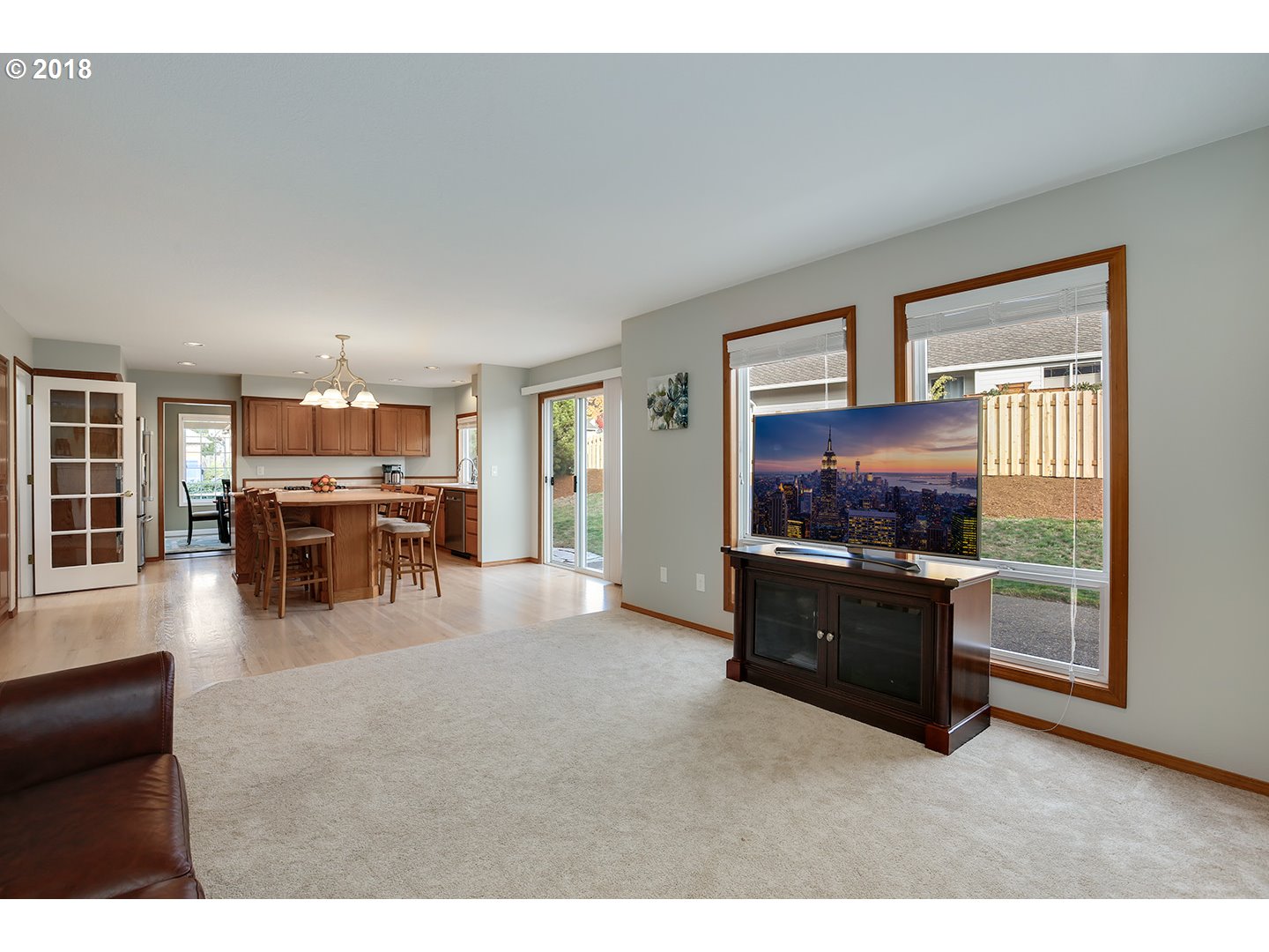 10470 Southwest 135th Avenue Beaverton, OR 97008 - Photo 7 of 32 a living room with furniture and a flat screen tv