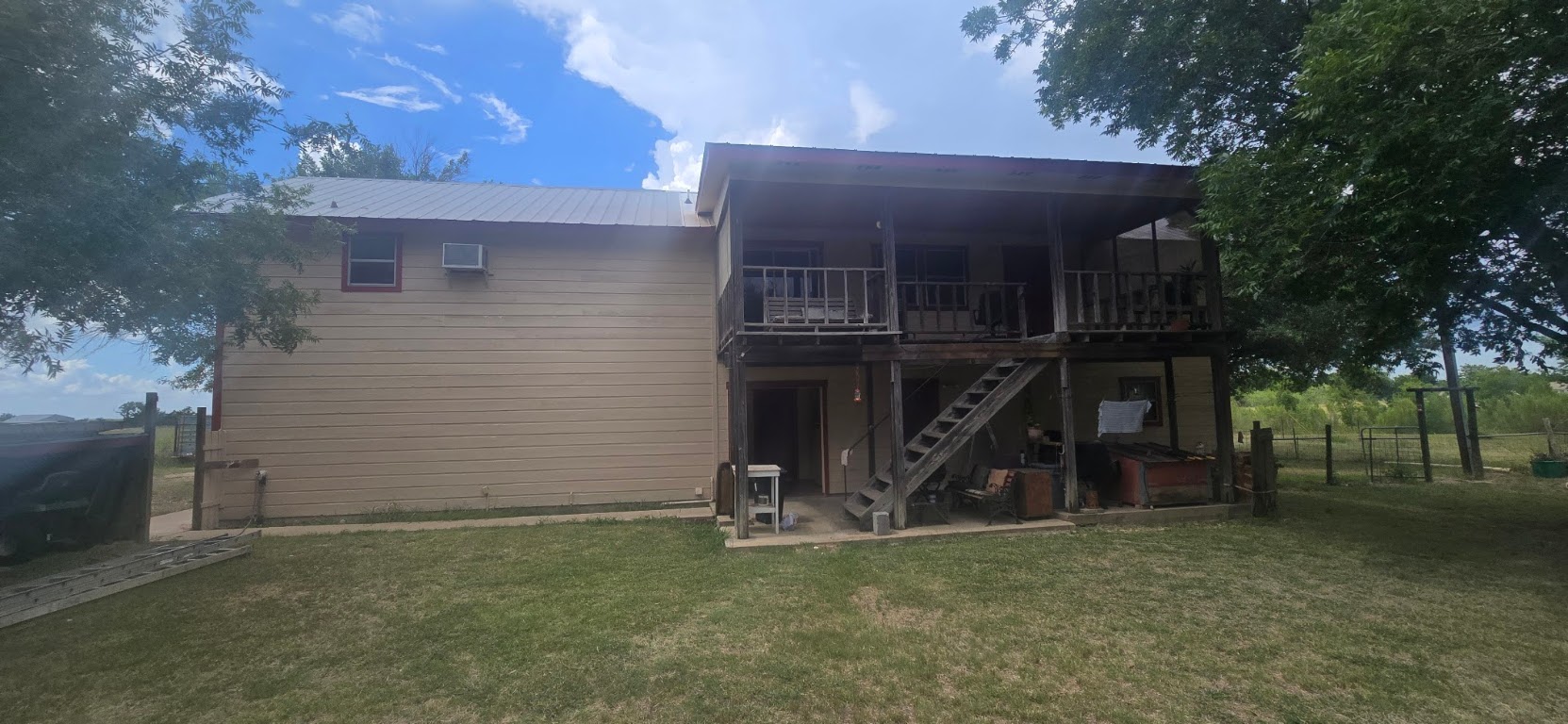 201 930 Par Taylor, TX 76574 - Photo 4 of 27 a view of a house with a yard