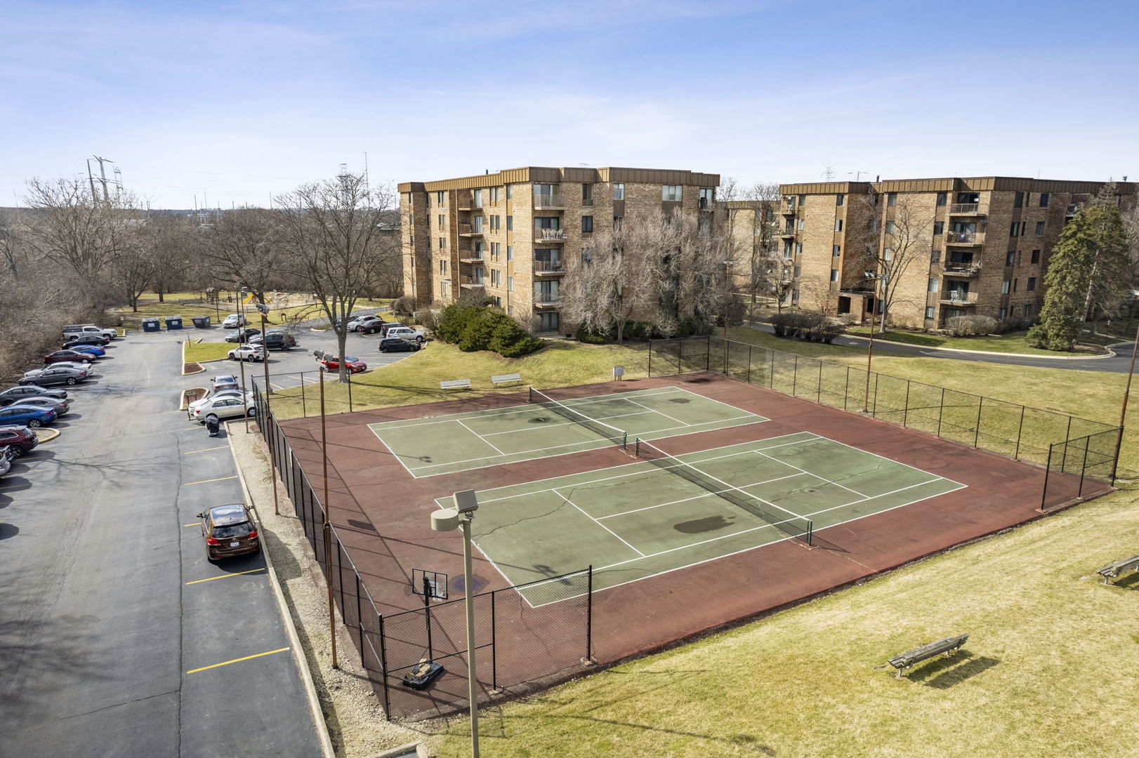 425 Walnut Creek Road, Unit 1401 Lisle, IL 60532 - Photo 15 of 19 a view of a tennis court