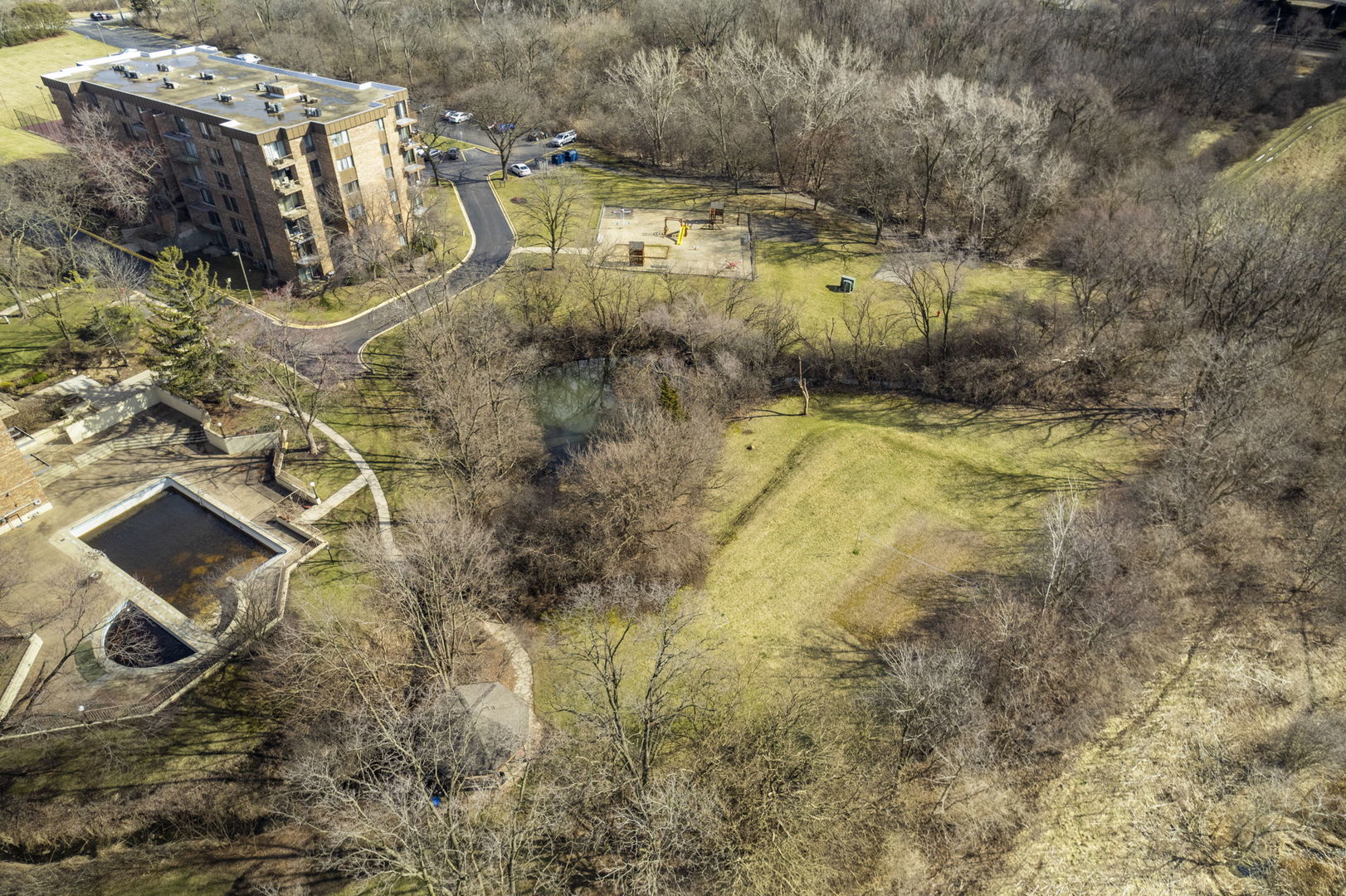 425 Walnut Creek Road, Unit 1401 Lisle, IL 60532 - Photo 16 of 19 a view of swimming pool and mountain