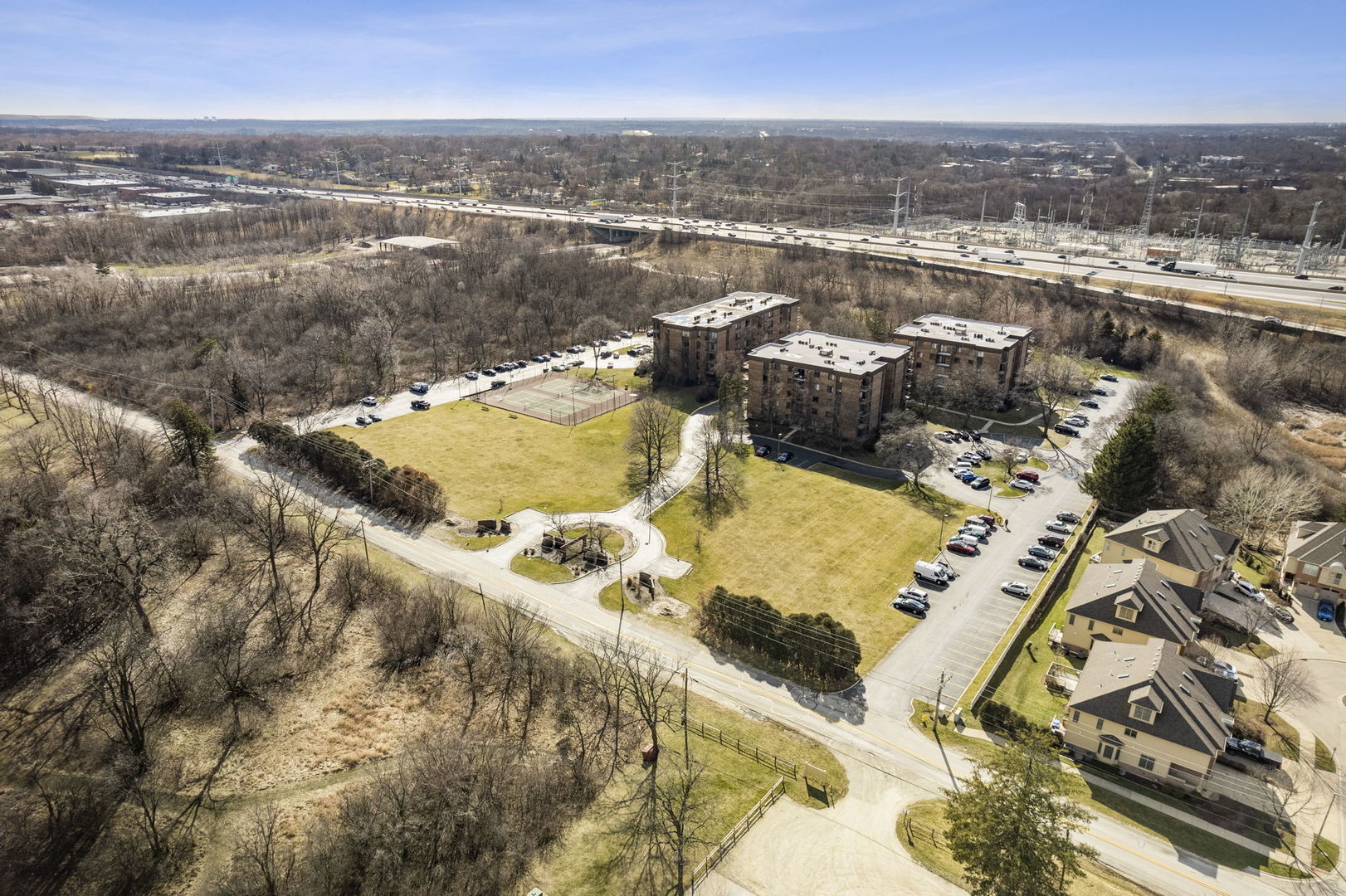 425 Walnut Creek Road, Unit 1401 Lisle, IL 60532 - Photo 19 of 19 an aerial view of residential houses with outdoor space