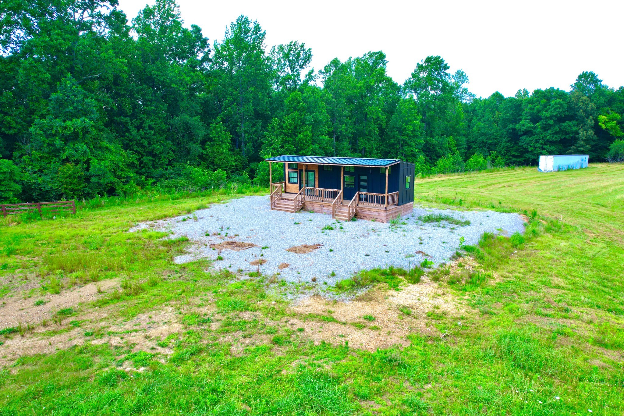 68 Bassham Road Five Points, TN 38457 - Photo 12 of 18 a view of a chairs and backyard with large trees