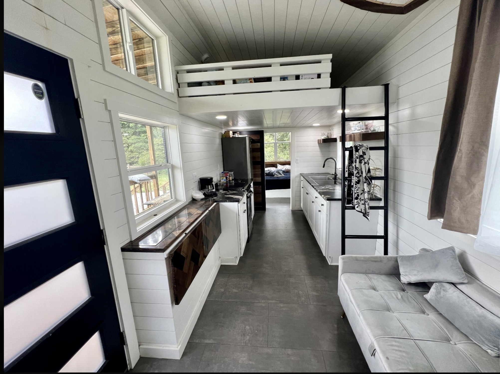 68 Bassham Road Five Points, TN 38457 - Photo 5 of 18 a hallway with furniture a washer and dryer