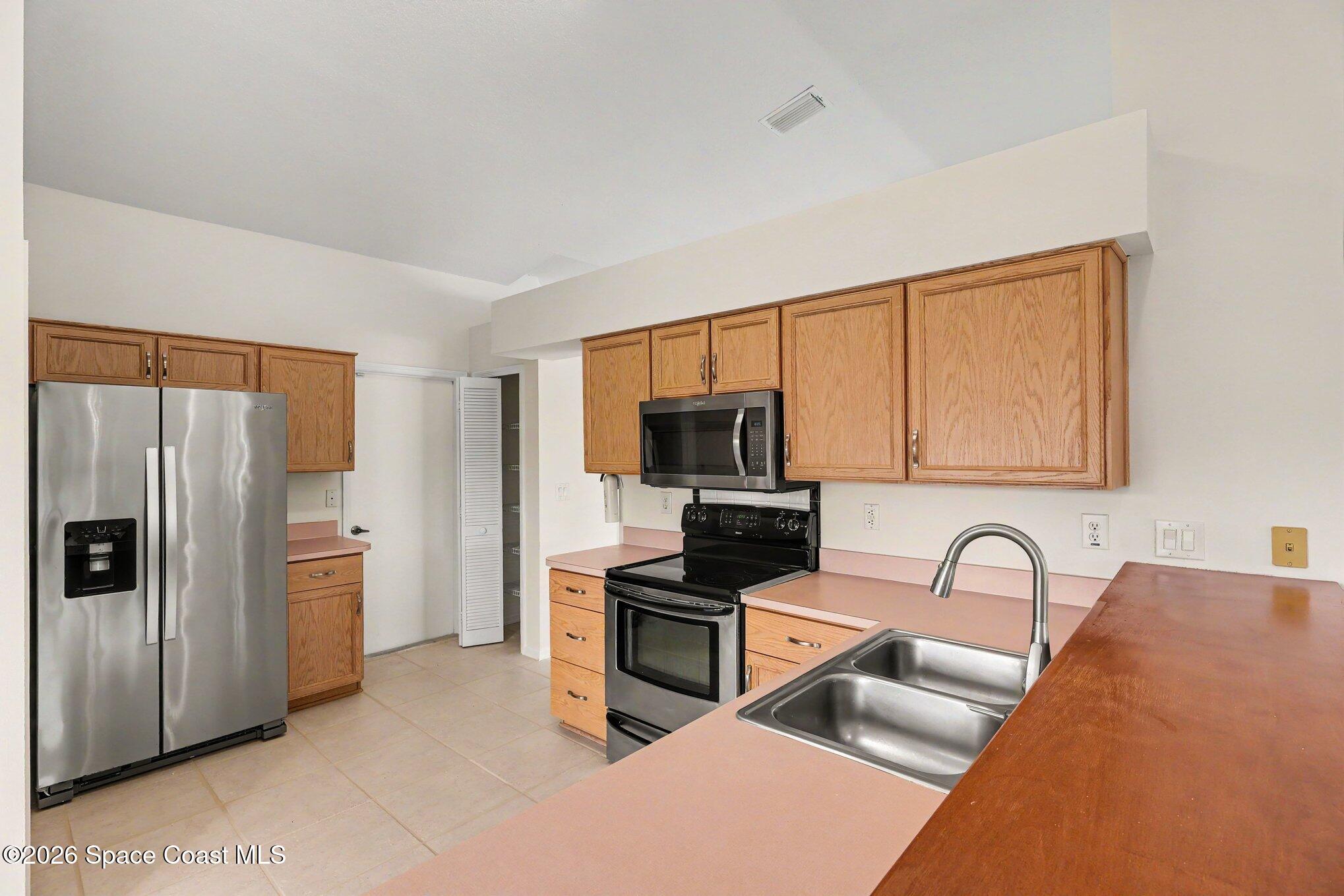 1230 Meadowbrook Road Northeast Palm Bay, FL 32905 - Photo 9 of 43 Kitchen