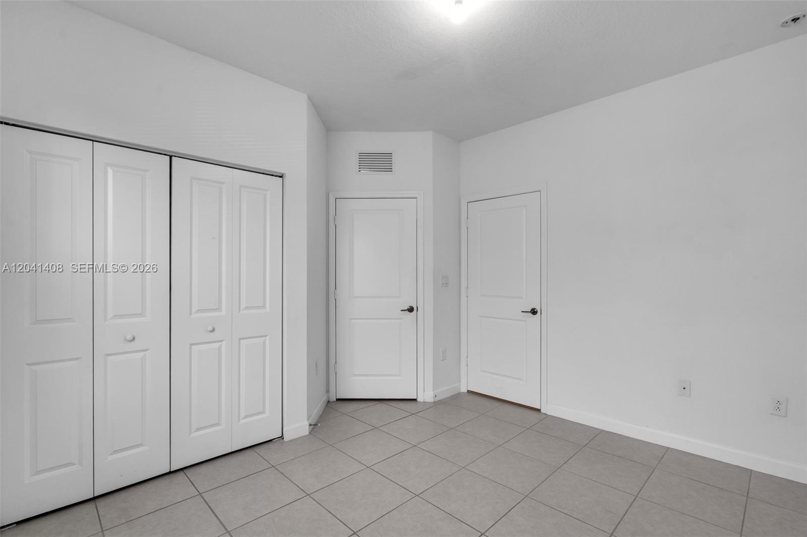 12950 Southwest 232nd Lane Homestead, FL 33032 - Photo 7 of 43 First Floor Bedroom