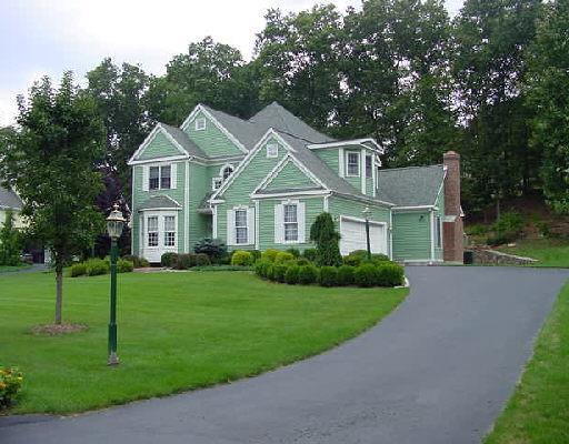 88 Meadow Road Trumbull, CT 06611 - Photo 1 of 1 a front view of a house with a garden and yard
