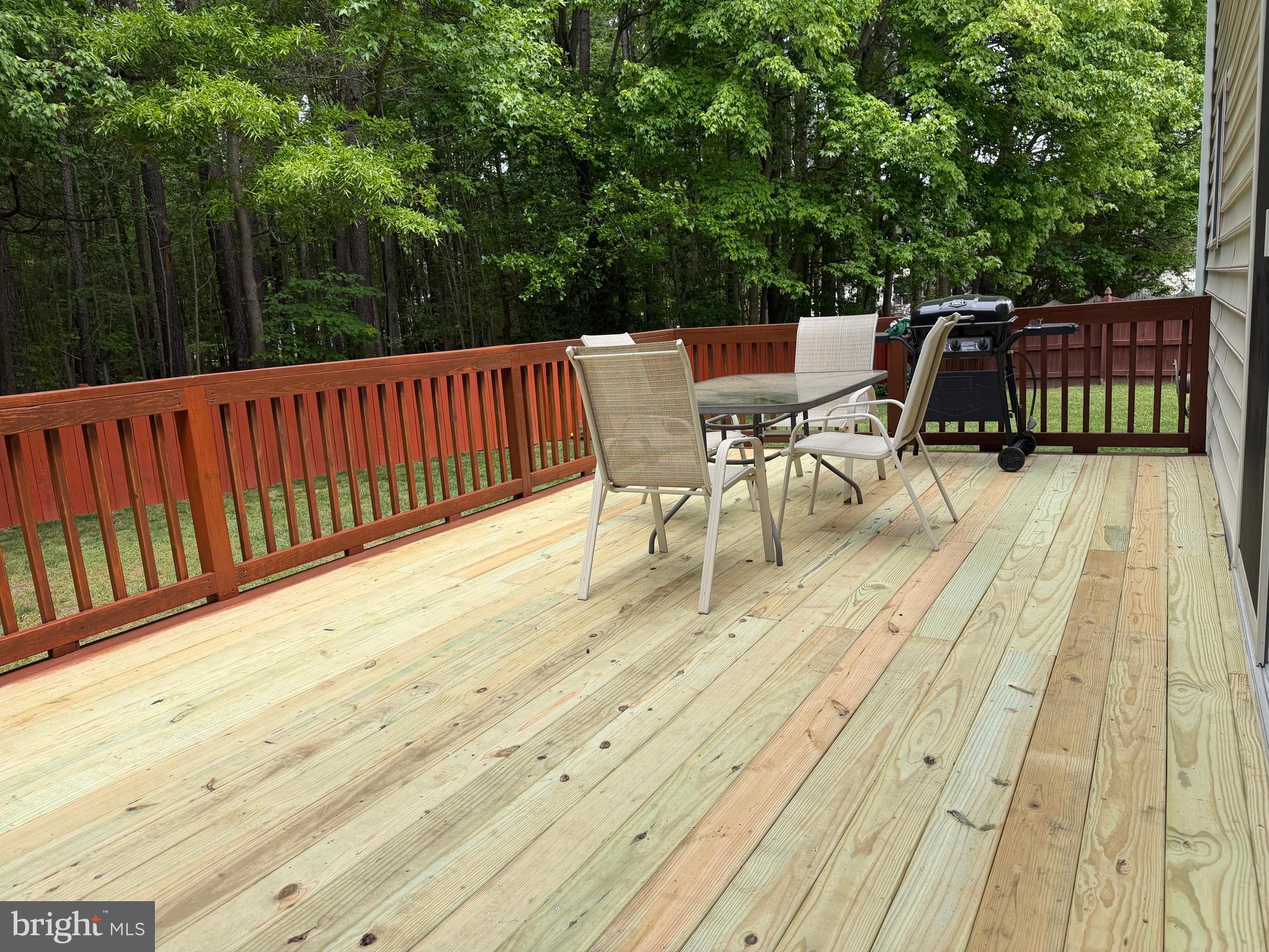 112 Rilian Court Grasonville, MD 21638 - Photo 38 of 55 a view of balcony with wooden floor and outdoor seating
